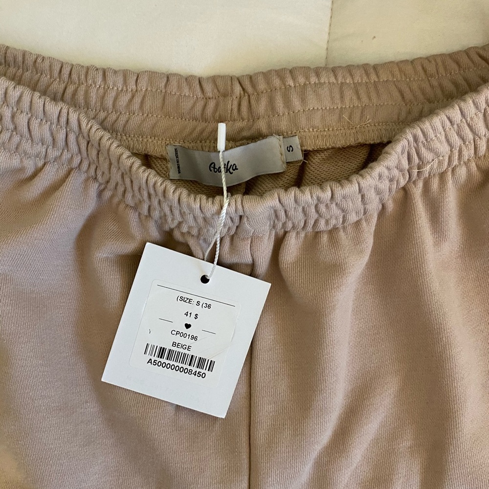 Never worn - tan joggers